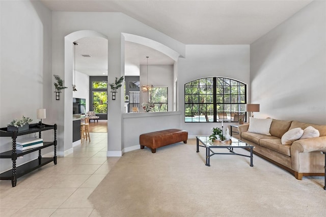 6710 Merryvale Ln, Port Orange, FL 32128 - living room with light tile patterned floors and arched walkways