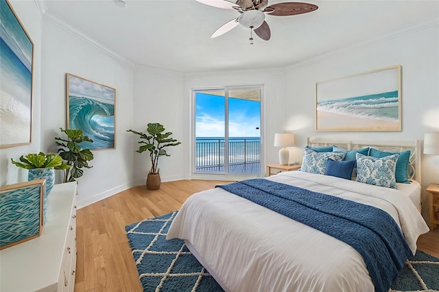 2515 S Atlantic Ave Unit 507, Daytona Beach, FL 32118 - bedroom with access to outside, light wood-type flooring, a water view, crown molding, and a ceiling fan
