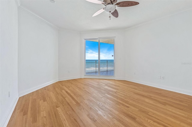 2515 S Atlantic Ave Unit 507, Daytona Beach, FL 32118 - empty room with a ceiling fan, light wood finished floors, crown molding, and a water view