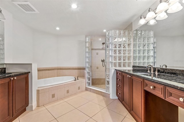 2515 S Atlantic Ave Unit 507, Daytona Beach, FL 32118 - full bath with vanity, a stall shower, tile patterned floors, a garden tub, and recessed lighting