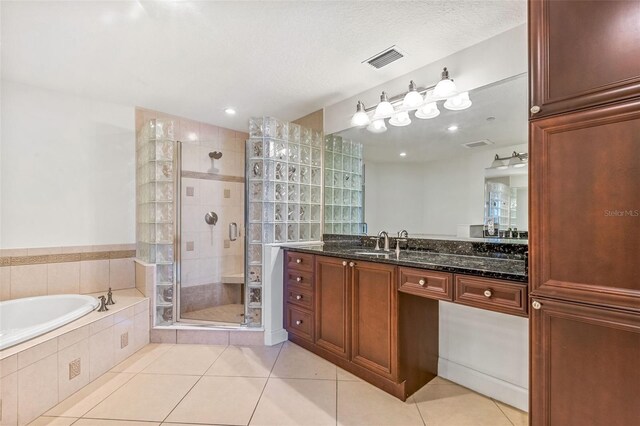 2515 S Atlantic Ave Unit 507, Daytona Beach, FL 32118 - bathroom featuring vanity, a stall shower, tile patterned floors, a garden tub, and recessed lighting
