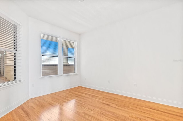 2515 S Atlantic Ave Unit 507, Daytona Beach, FL 32118 - unfurnished room featuring light wood-style flooring and baseboards