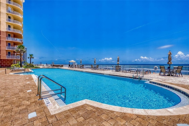 2515 S Atlantic Ave Unit 507, Daytona Beach, FL 32118 - community pool featuring a patio