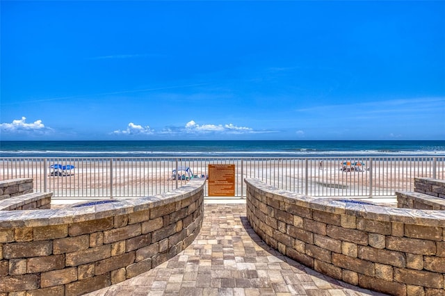 2515 S Atlantic Ave Unit 507, Daytona Beach, FL 32118 - view of patio / terrace featuring view of water and beach