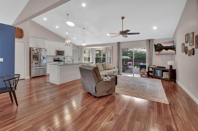 1522 E Silver Hammock, Deland, FL 32720 - living area featuring a ceiling fan, wood finished floors, high vaulted ceiling, and recessed lighting