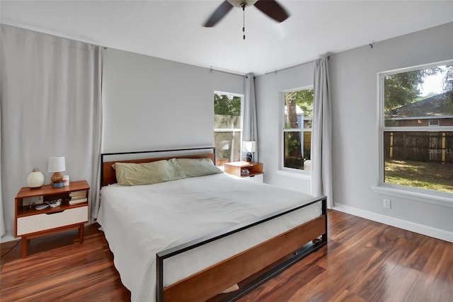 1522 E Silver Hammock, Deland, FL 32720 - bedroom with dark wood-type flooring and ceiling fan