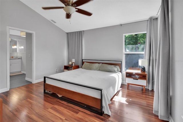 1522 E Silver Hammock, Deland, FL 32720 - bedroom featuring lofted ceiling, wood finished floors, ensuite bath, and ceiling fan