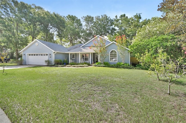 1522 E Silver Hammock, Deland, FL 32720 - view of front of home with a garage, a front yard, and concrete driveway