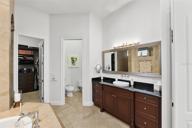 12812 Jacob Grace Ct, Windermere, FL 34786 - full bath with a bidet, vanity, and a walk in closet