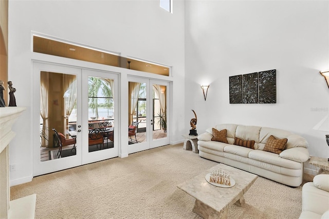 12812 Jacob Grace Ct, Windermere, FL 34786 - carpeted living area featuring french doors and a high ceiling