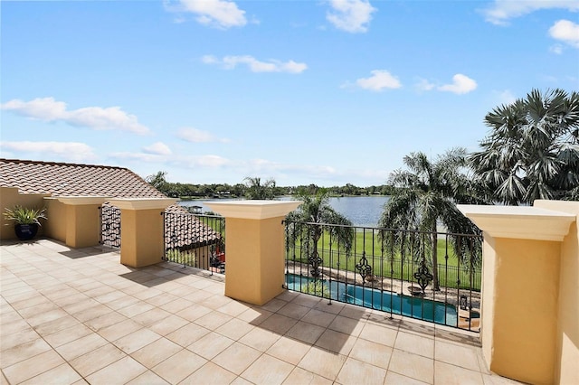 12812 Jacob Grace Ct, Windermere, FL 34786 - view of patio / terrace featuring a water view and an outdoor pool