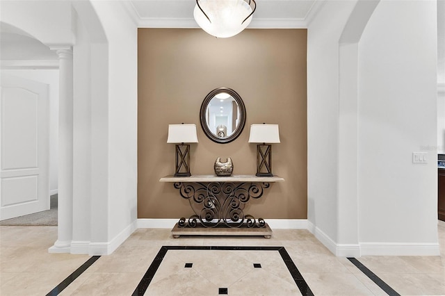 12812 Jacob Grace Ct, Windermere, FL 34786 - foyer featuring arched walkways, ornamental molding, inlaid floor details, and decorative columns