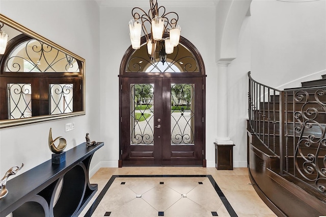 12812 Jacob Grace Ct, Windermere, FL 34786 - foyer featuring inlaid floor details, a chandelier, a towering ceiling, and stairway