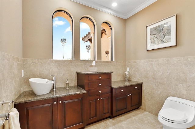 12812 Jacob Grace Ct, Windermere, FL 34786 - bathroom featuring tile walls, vanity, and crown molding