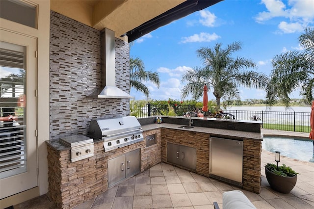 12812 Jacob Grace Ct, Windermere, FL 34786 - view of patio featuring a water view and an outdoor kitchen