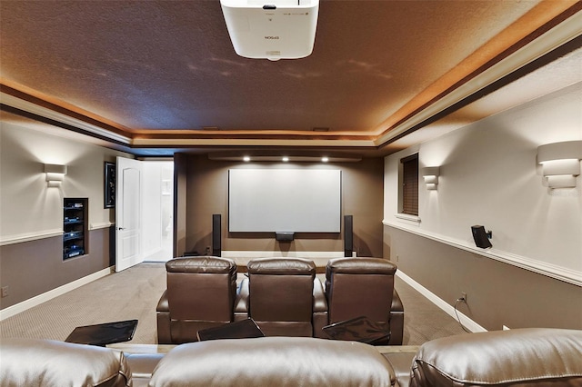 12812 Jacob Grace Ct, Windermere, FL 34786 - home theater room featuring a tray ceiling and carpet flooring