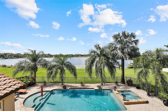 12812 Jacob Grace Ct, Windermere, FL 34786 - view of pool featuring a water view, a pool with connected hot tub, and a fenced backyard