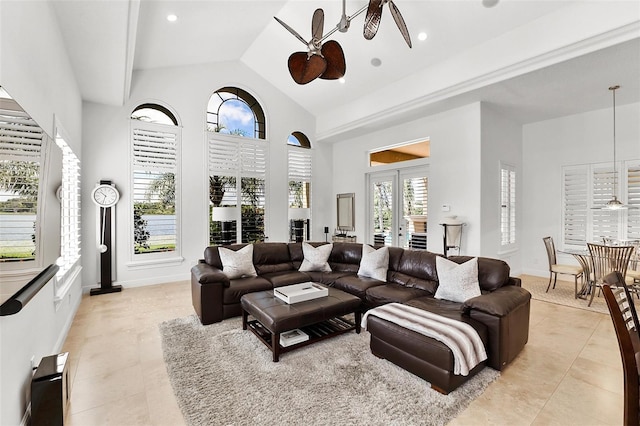 12812 Jacob Grace Ct, Windermere, FL 34786 - living area featuring light tile patterned flooring, high vaulted ceiling, and recessed lighting