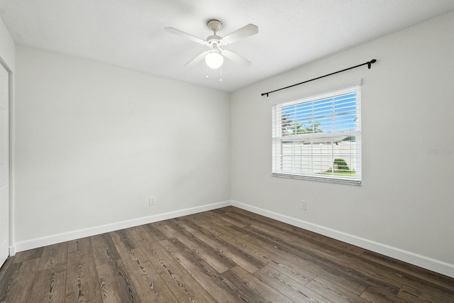 2931 Lantern Dr, South Daytona, FL 32119 - empty room featuring dark wood-style floors and a ceiling fan