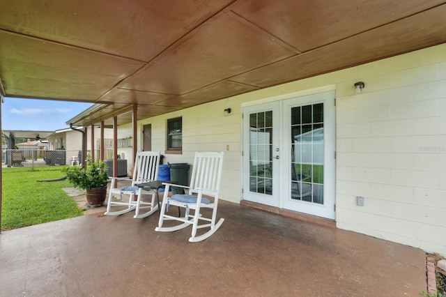 2931 Lantern Dr, South Daytona, FL 32119 - view of patio featuring french doors