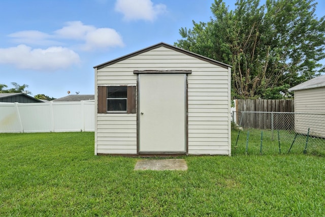 2931 Lantern Dr, South Daytona, FL 32119 - view of shed with a fenced backyard