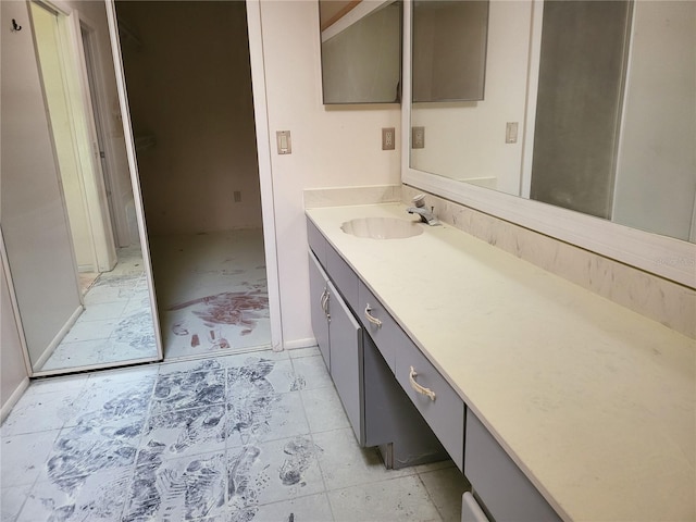 5915 Crystal View Dr, Orlando, FL 32819 - bathroom featuring vanity and tile patterned flooring