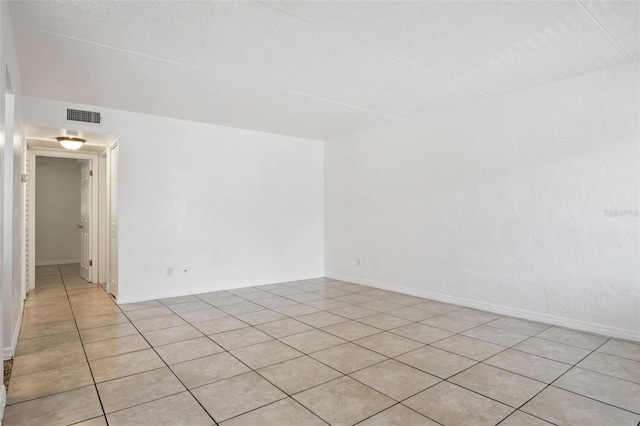 415 N Halifax Ave Unit 109, Daytona Beach, FL 32118 - unfurnished room featuring light tile patterned floors