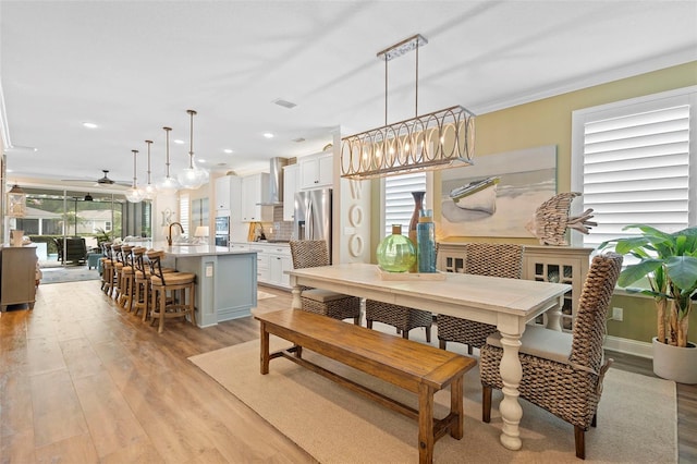 249 Kellet Way, Saint Johns, FL 32259 - dining space featuring light wood-style floors, ceiling fan, recessed lighting, crown molding, and a chandelier