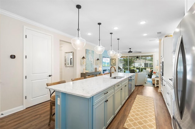 249 Kellet Way, Saint Johns, FL 32259 - kitchen featuring appliances with stainless steel finishes, dark wood-style floors, recessed lighting, a ceiling fan, and a center island with sink