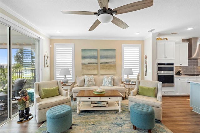 249 Kellet Way, Saint Johns, FL 32259 - living area featuring crown molding, healthy amount of natural light, wood finished floors, ceiling fan, and recessed lighting
