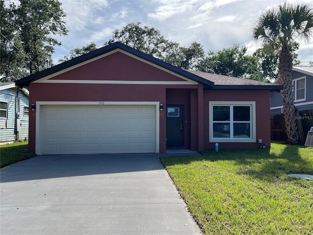 1510 Granada Ave, Daytona Beach, FL 32117 - ranch-style house with driveway, a front yard, stucco siding, and an attached garage
