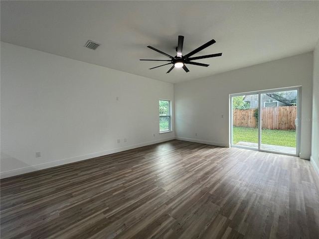 1510 Granada Ave, Daytona Beach, FL 32117 - unfurnished room with dark wood-style flooring and a ceiling fan