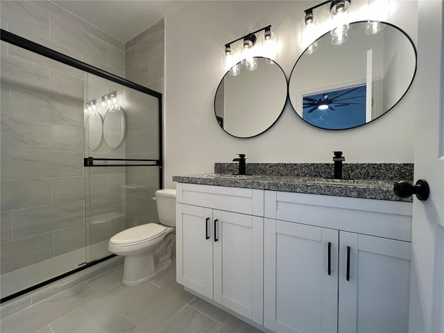 1510 Granada Ave, Daytona Beach, FL 32117 - full bath featuring double vanity, a shower stall, and a ceiling fan