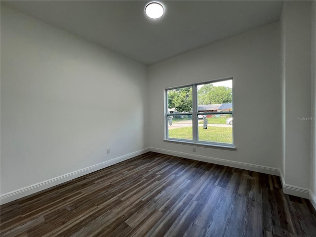 1510 Granada Ave, Daytona Beach, FL 32117 - unfurnished room featuring baseboards and dark wood finished floors