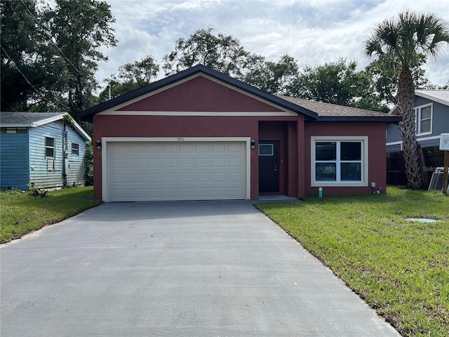1510 Granada Ave, Daytona Beach, FL 32117 - single story home featuring driveway, stucco siding, a front yard, and a garage