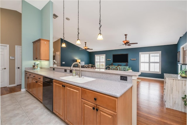 6151 Sabal Point Cir, Port Orange, FL 32128 - kitchen with open floor plan, dishwasher, a ceiling fan, light countertops, and high vaulted ceiling