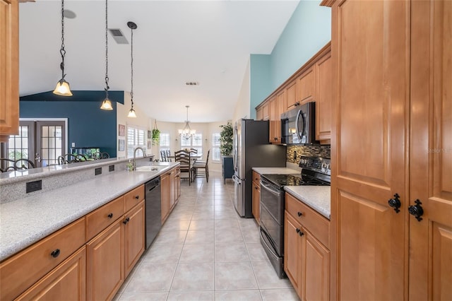 6151 Sabal Point Cir, Port Orange, FL 32128 - kitchen with black appliances, backsplash, a chandelier, hanging light fixtures, and light tile patterned floors
