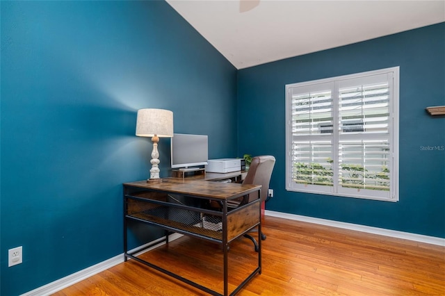 6151 Sabal Point Cir, Port Orange, FL 32128 - home office with lofted ceiling, wood finished floors, and a ceiling fan