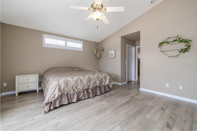 6151 Sabal Point Cir, Port Orange, FL 32128 - bedroom featuring vaulted ceiling, light wood-style flooring, and a ceiling fan