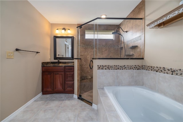 6151 Sabal Point Cir, Port Orange, FL 32128 - bathroom featuring a garden tub, vanity, a stall shower, and tile patterned flooring