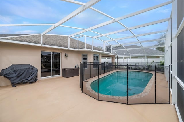 6151 Sabal Point Cir, Port Orange, FL 32128 - view of pool featuring a patio, a grill, and a lanai