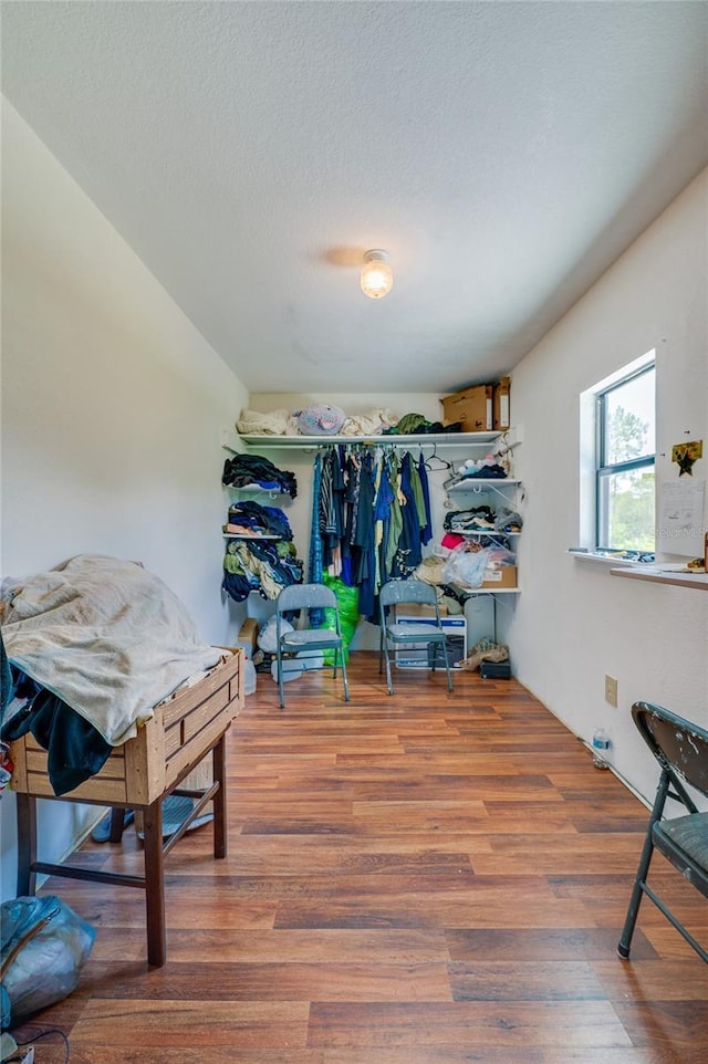 4666 Fir Rd, New Smyrna Beach, FL 32168 - spacious closet featuring wood finished floors