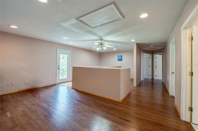 4666 Fir Rd, New Smyrna Beach, FL 32168 - unfurnished room with a textured ceiling, wood finished floors, attic access, and recessed lighting