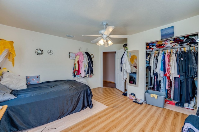 4666 Fir Rd, New Smyrna Beach, FL 32168 - bedroom with wood finished floors, a closet, and ceiling fan