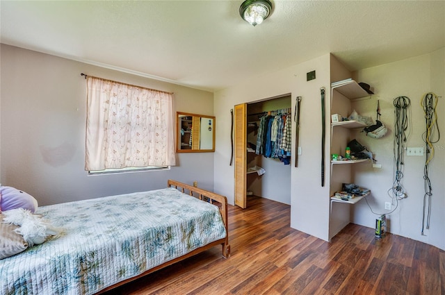 4666 Fir Rd, New Smyrna Beach, FL 32168 - bedroom featuring wood finished floors and a closet