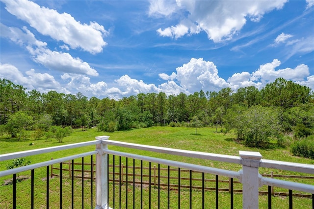 4666 Fir Rd, New Smyrna Beach, FL 32168 - wooden terrace with a yard and a forest view
