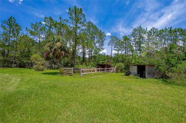 4666 Fir Rd, New Smyrna Beach, FL 32168 - view of yard with an outbuilding