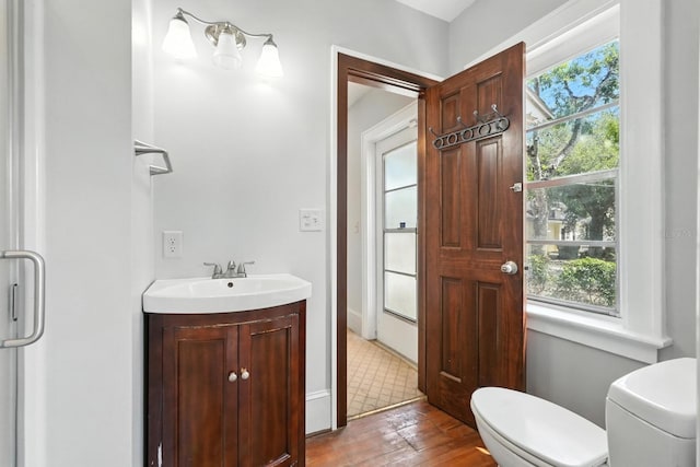 200 N St, Daytona Beach, FL 32114 - bathroom featuring vanity and wood finished floors