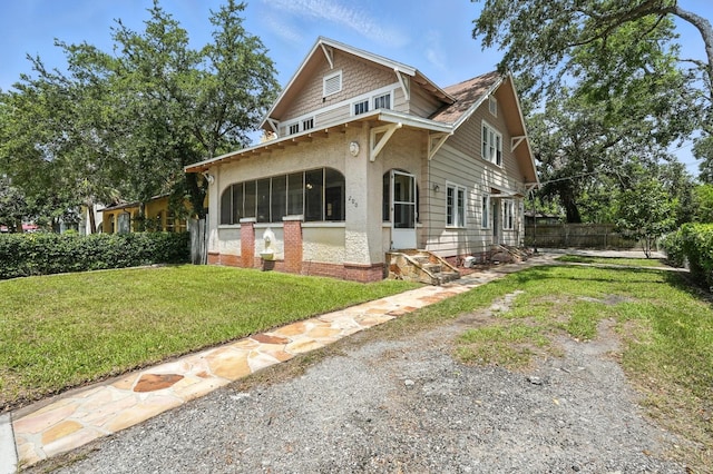 200 N St, Daytona Beach, FL 32114 - view of front of property featuring stucco siding and entry steps