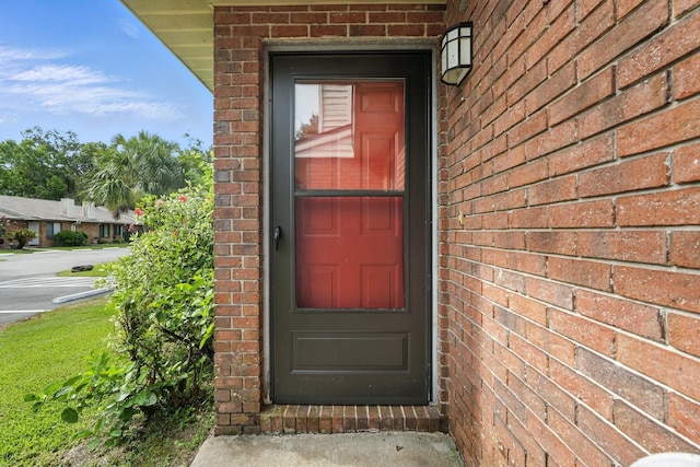 1512 Heritage Ln, Daytona Beach, FL 32117 - view of exterior entry featuring brick siding
